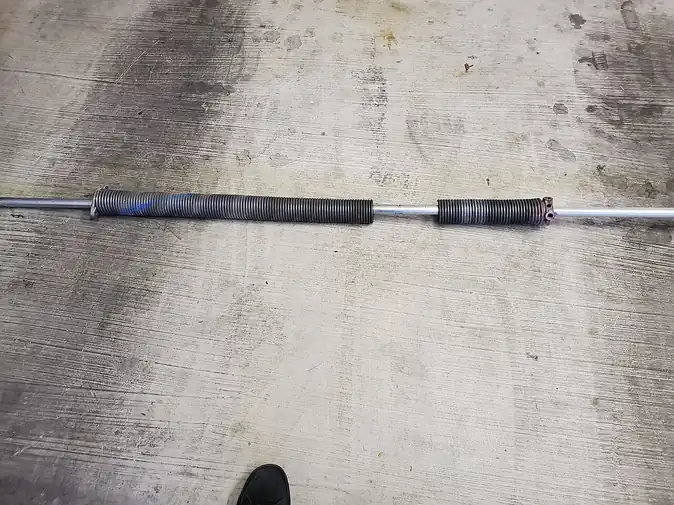 Garage Door Torsion Spring Repair Guide
