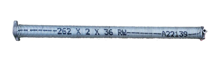garage door torsion spring repair detail 1 — coiled metal spring industrial